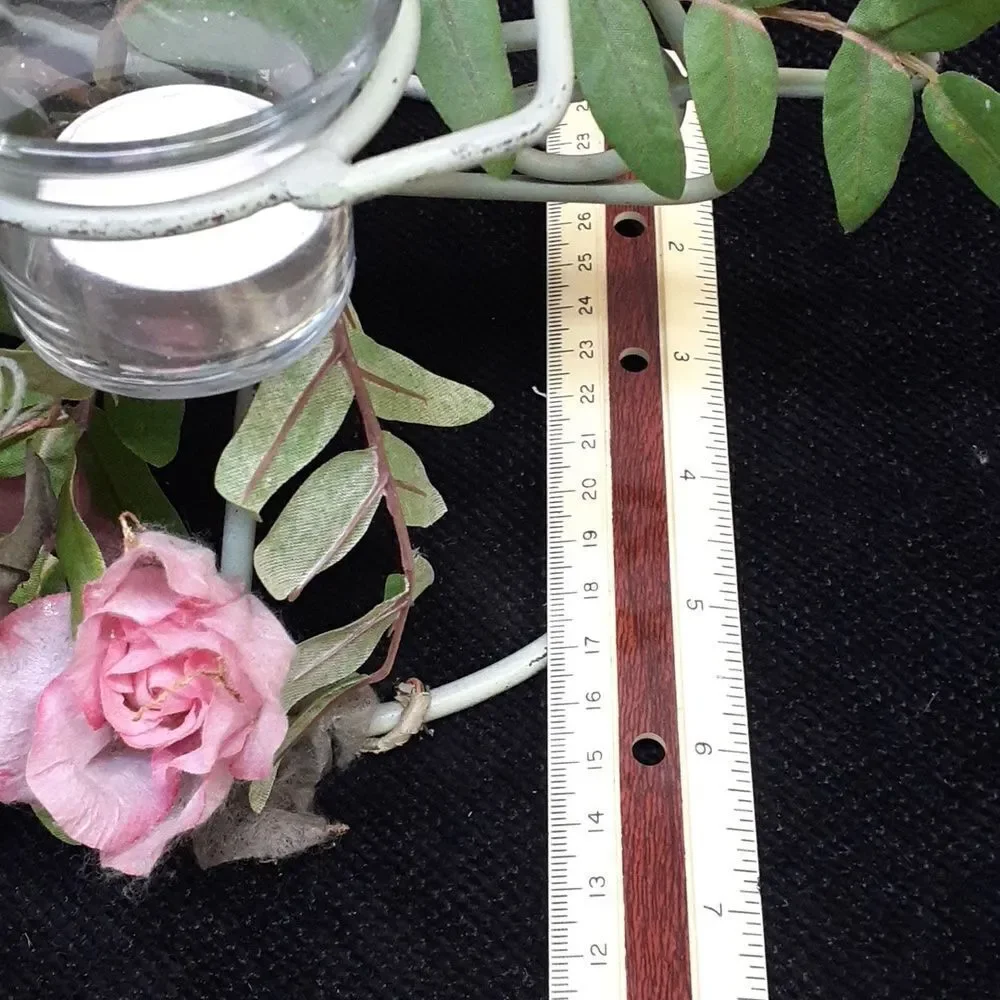 Verde Green Iron angel‎ with trailing pink roses